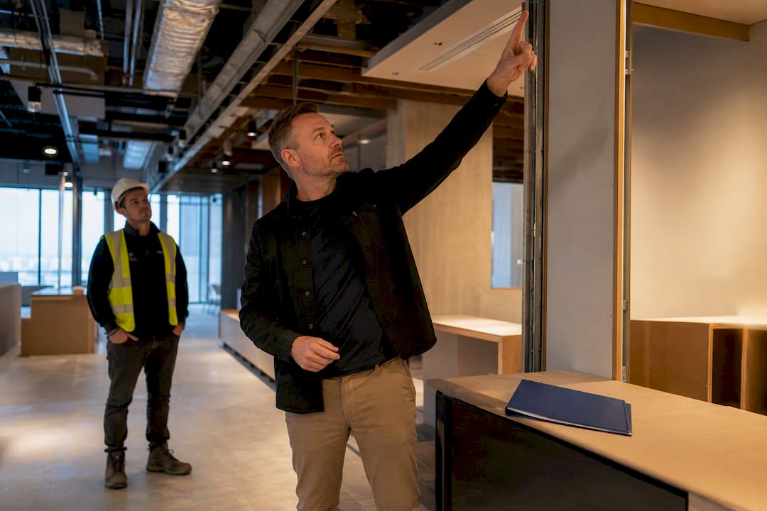 Tenant leader inspecting office fitout coordination