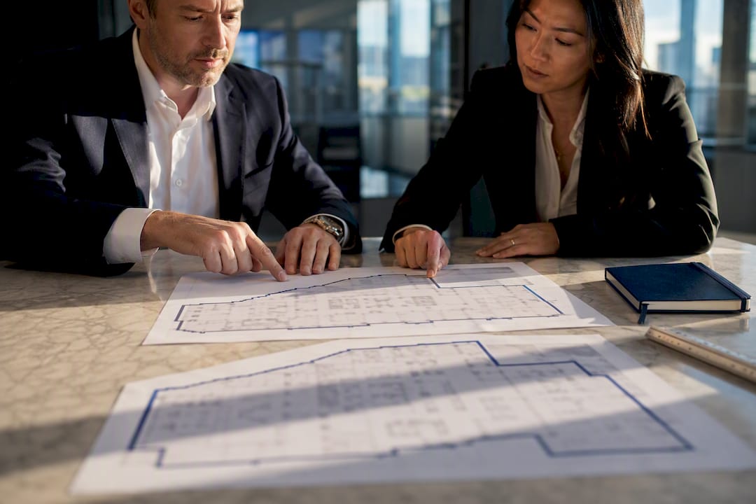 Tenant representative reviewing office tenancy plans