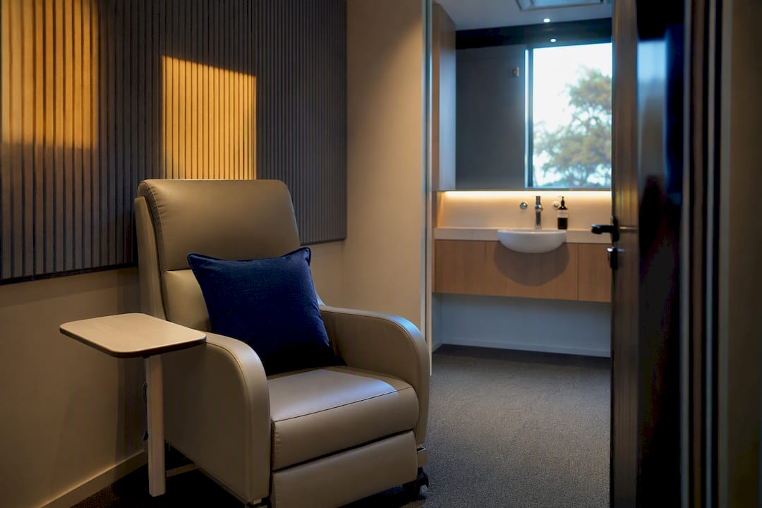 Workplace wellness room with nursing chair