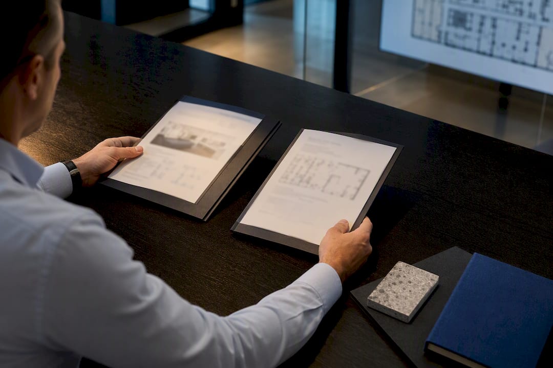 Project manager comparing fitout tender submissions