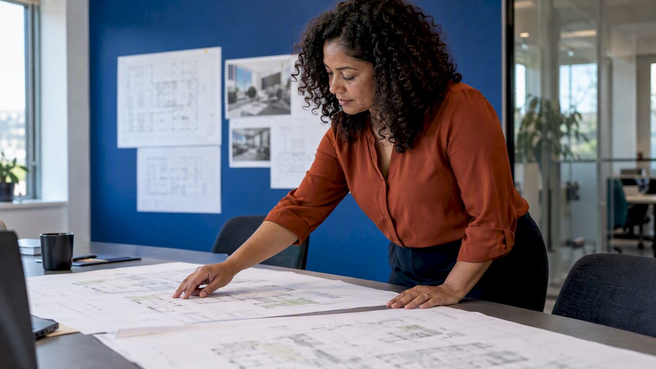 Workplace lead compares current and proposed office plans