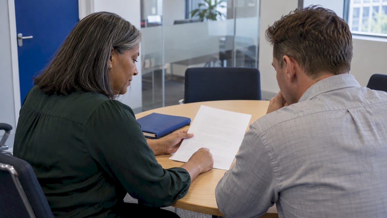 Tenant reviewing written lease release confirmation